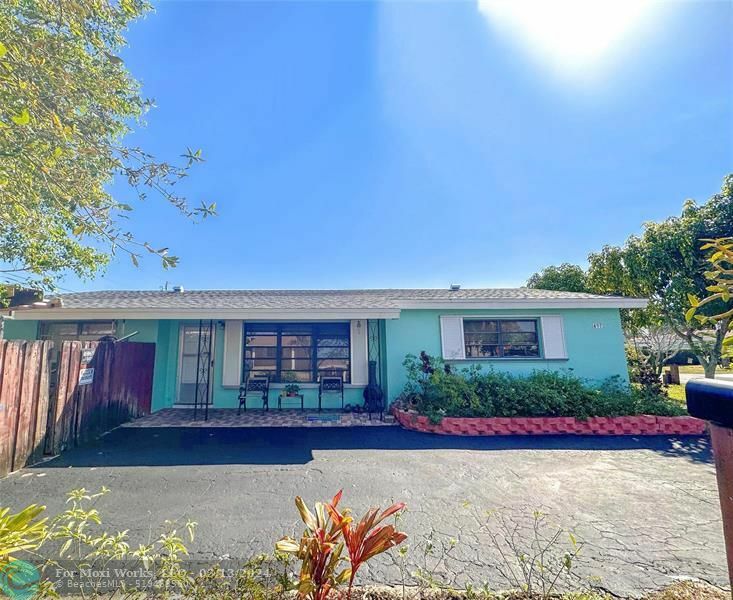 Property Photo:  497 NW 47th Ct  FL 33309 