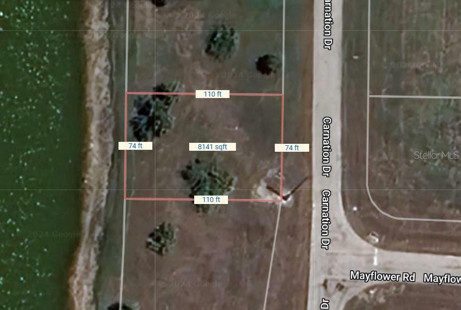 Property Photo: 61 Carnation Dr FL 33946