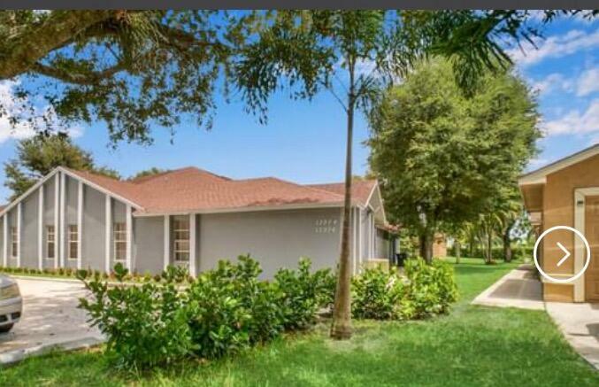 Property Photo:  13902 Folkestone Circle  FL 33414 