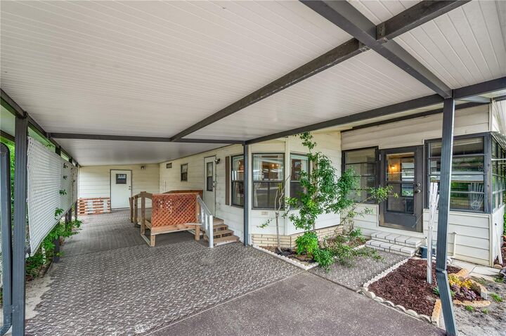 Property Photo: 6019 Grand Oaks Drive SE FL 33884