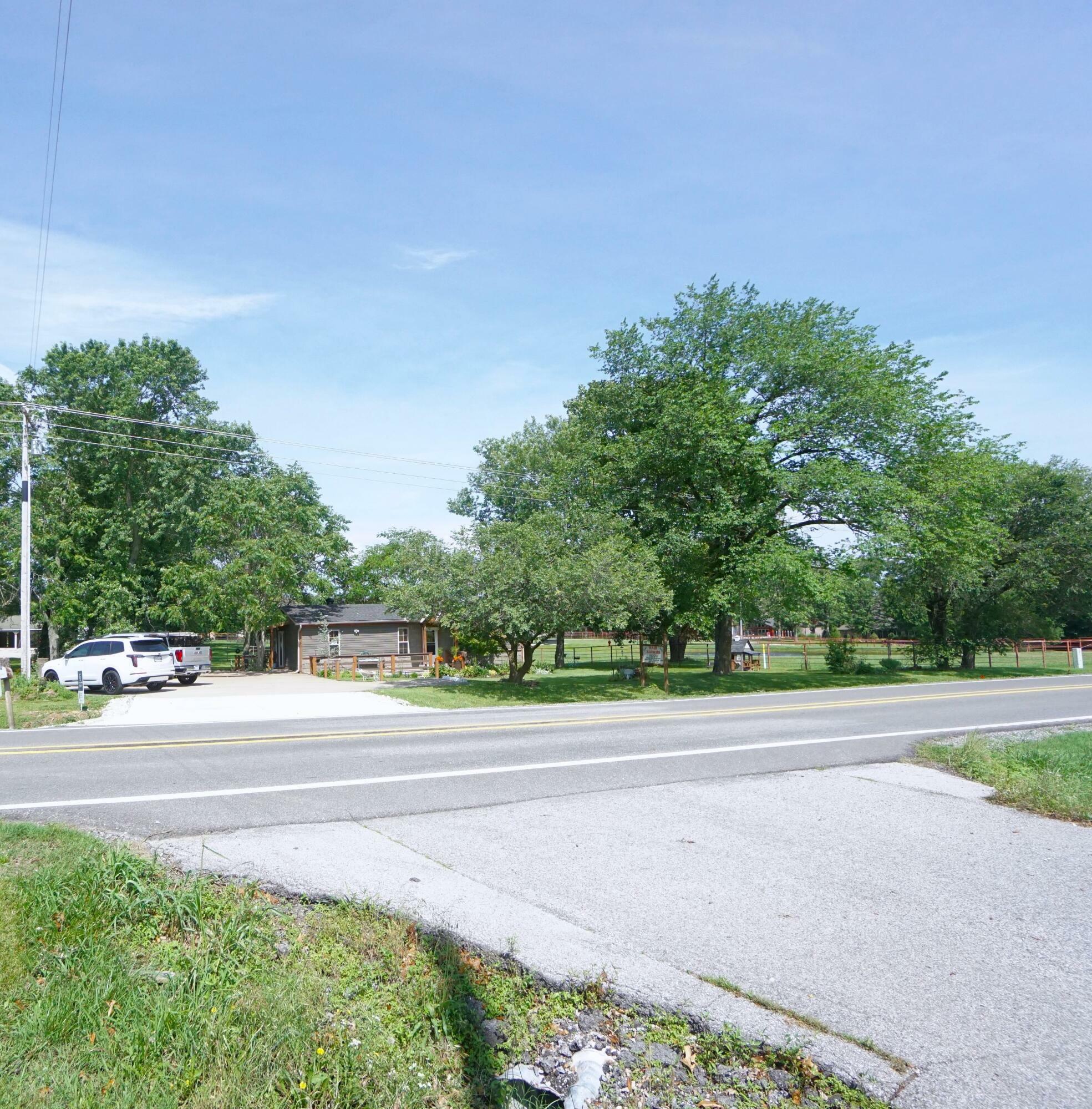 Property Photo:  9936 Highway 72  AR 72712 