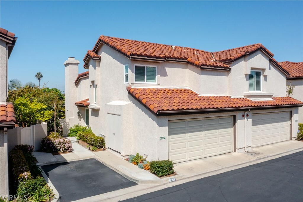 Property Photo:  8857 Grandville Circle 21  CA 92683 