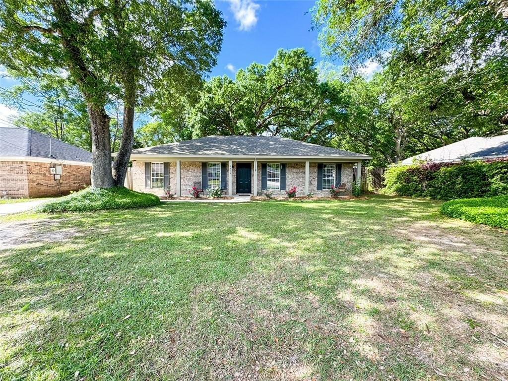 Property Photo: 6313 Woodside Drive N AL 36582