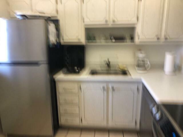 Property Photo:  5501 NW 2nd Avenue 114  FL 33487 