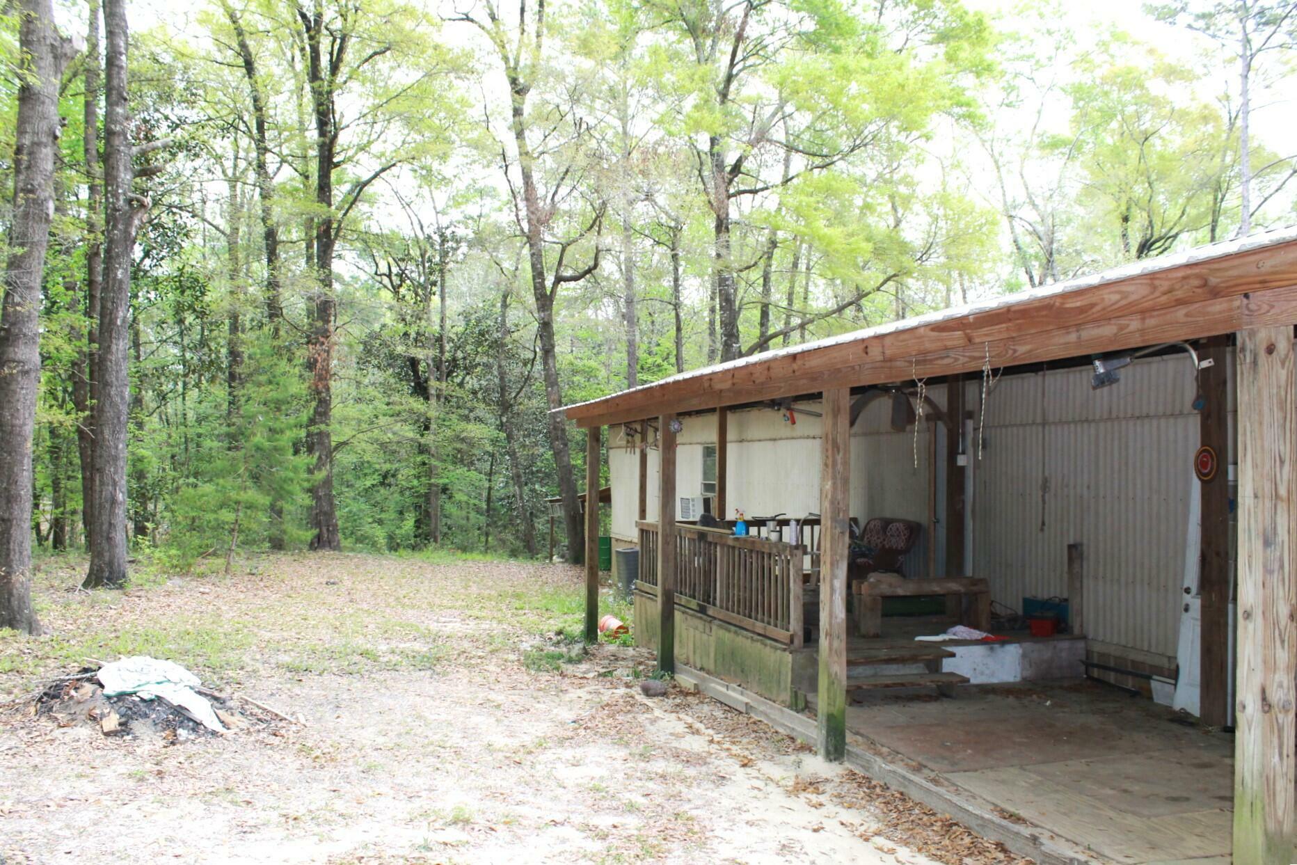 Property Photo:  6439 County Highway 183  FL 32455 