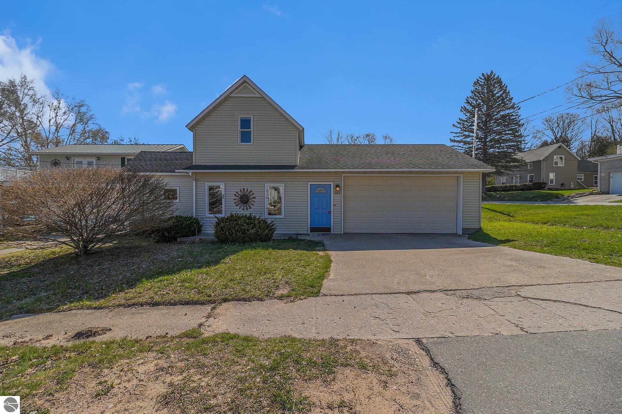 Property Photo:  323 Benzie Court  MI 49617 