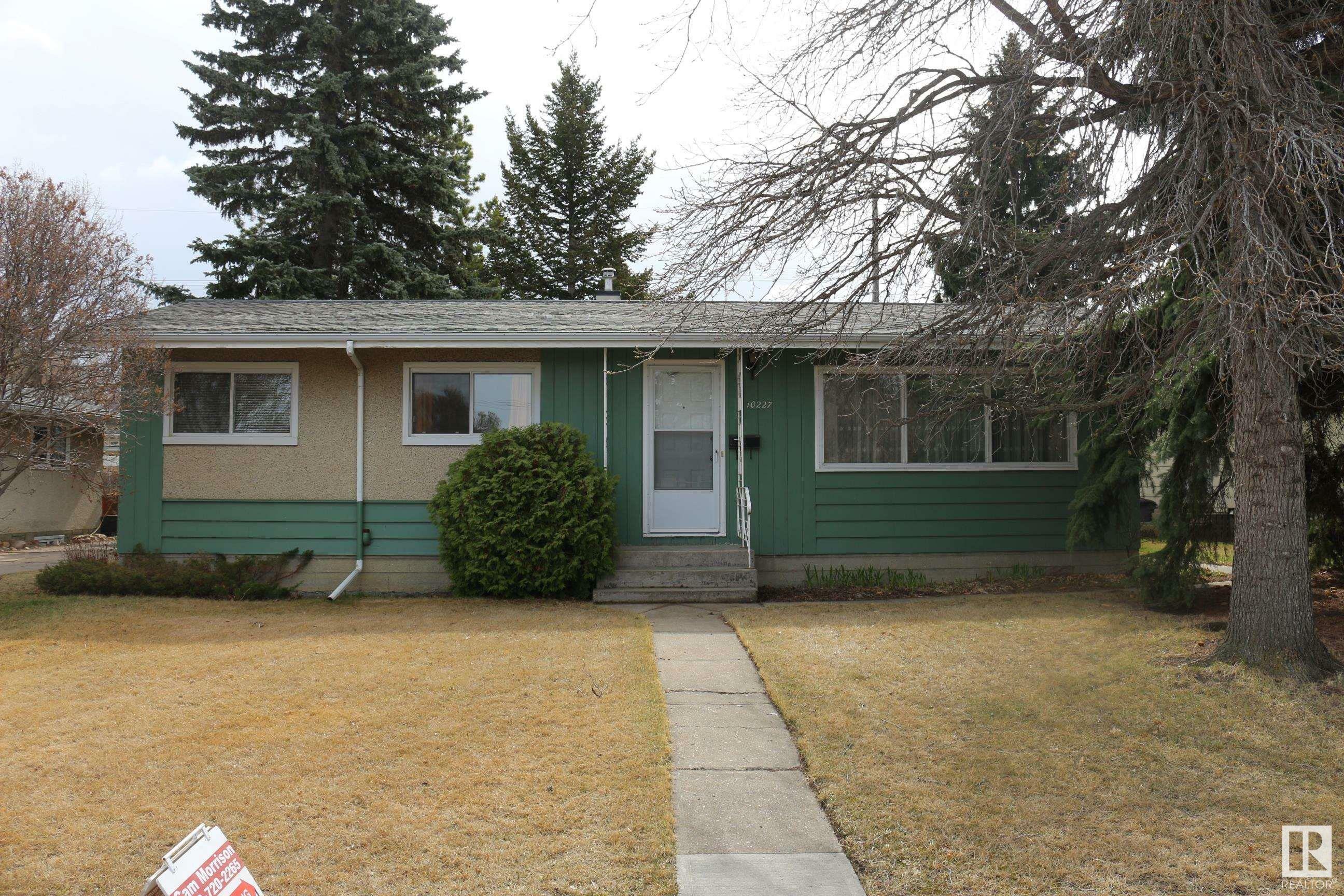 Property Photo:  10227 Fulton Road NW  AB T6A 3T5 