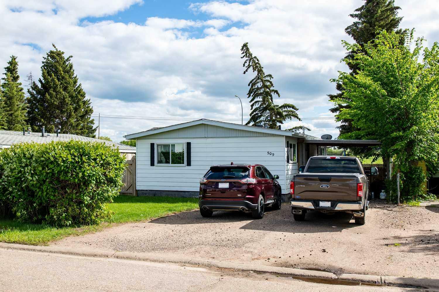 Property Photo:  509 2 Avenue Crescent  AB T9W 1A3 