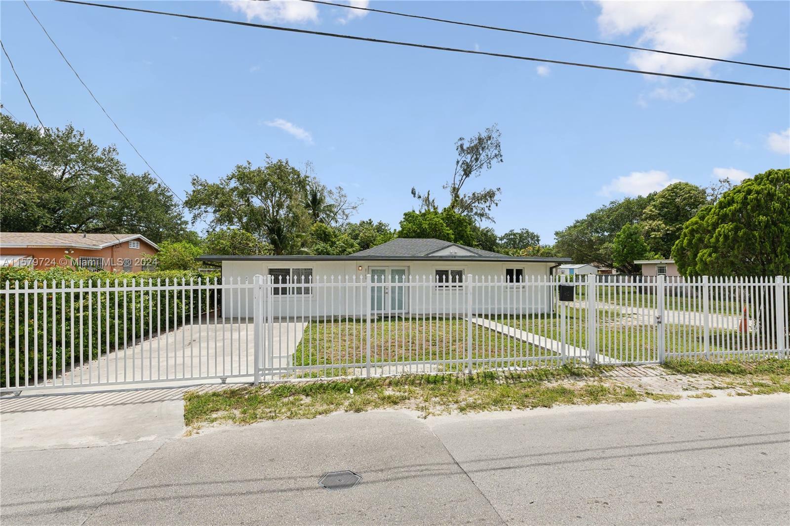 Property Photo:  8745 NW 21st Ave  FL 33147 