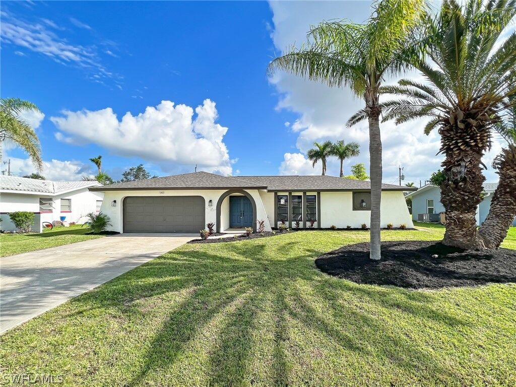 Property Photo:  141 SW 49th Street  FL 33914 