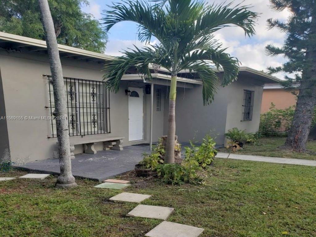 Property Photo:  1255 NW 121st St  FL 33167 