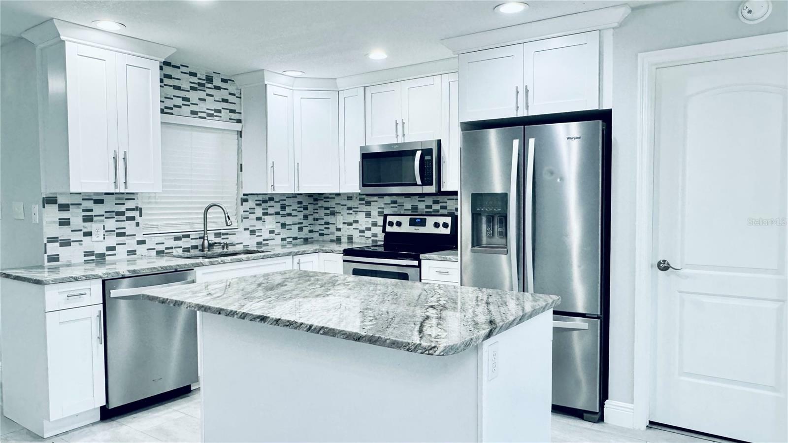 Property Photo: 7424 Isle Drive FL 34668