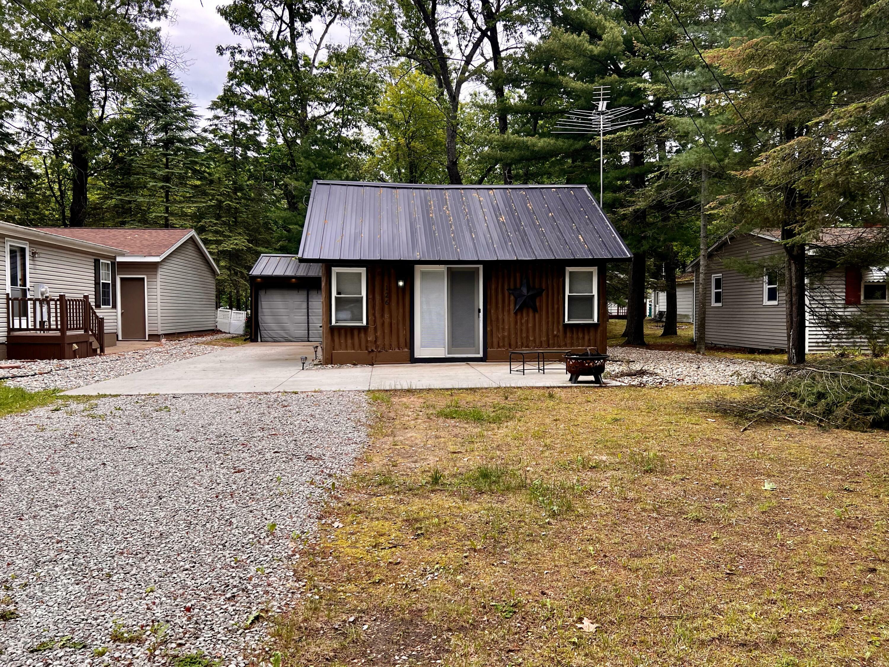 Property Photo:  126 Cottage Drive  MI 48651 