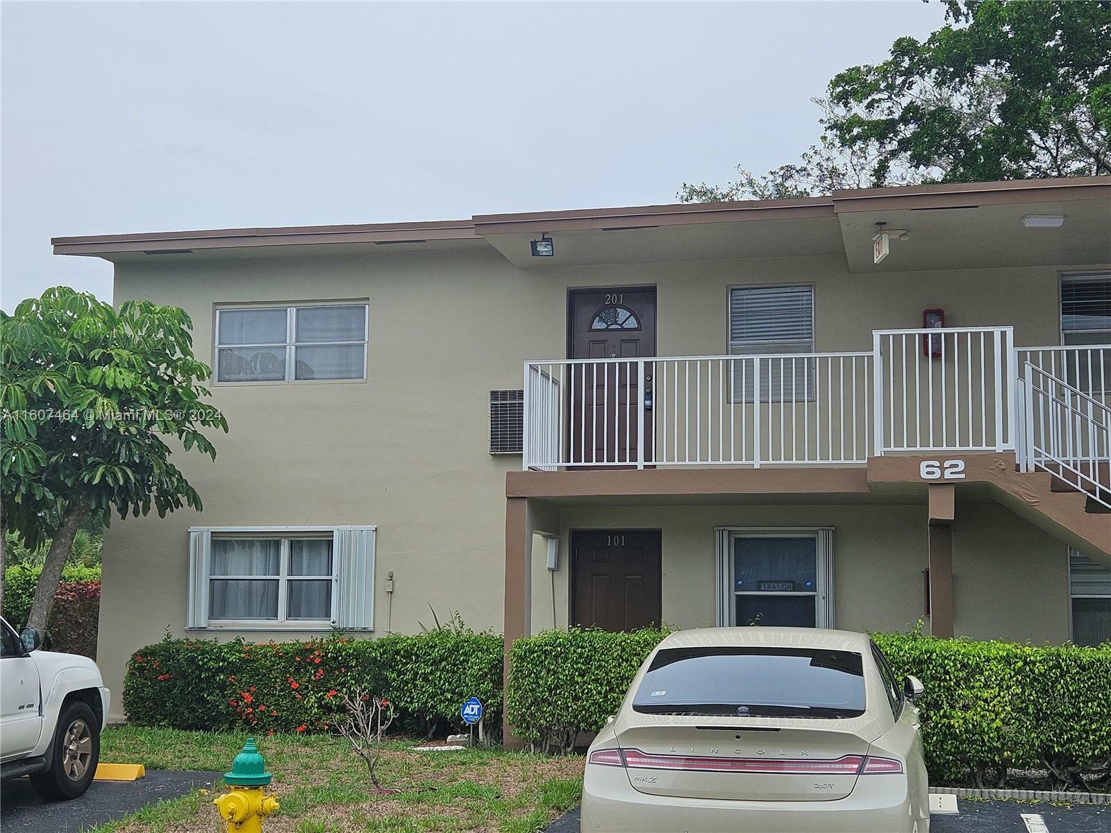 Property Photo:  601 NW 80th Ter 201  FL 33063 