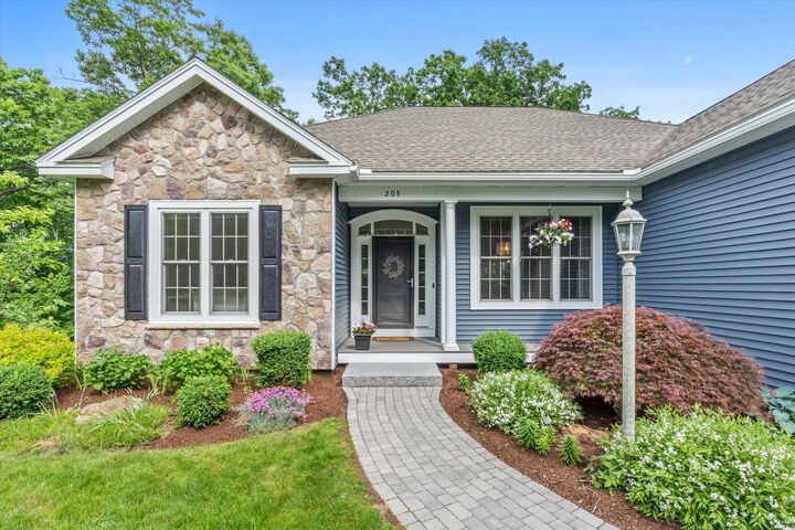 Property Photo:  205 Pleasant Pond Way  NH 03102 