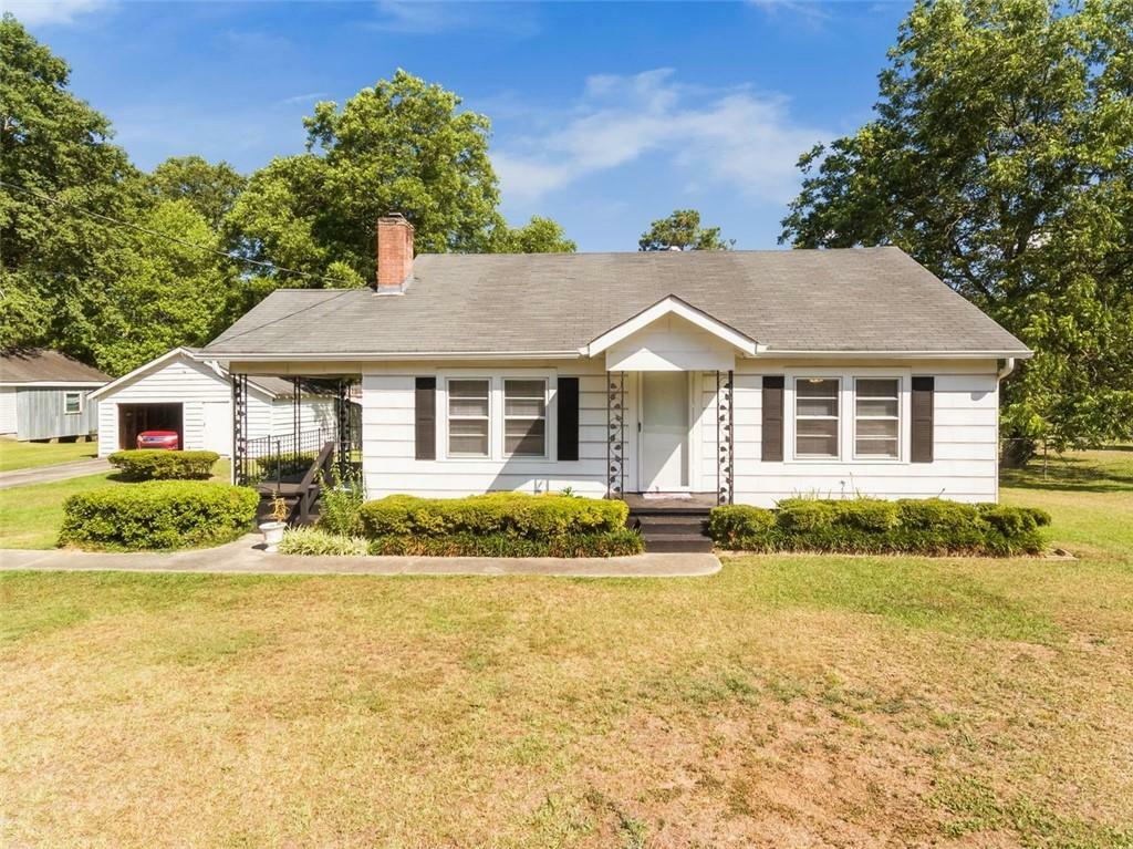 Property Photo:  116 Poplar Street  GA 30213 