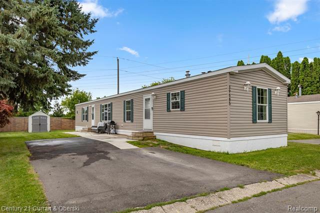 Property Photo:  39585 Neston  Street  MI 48377 