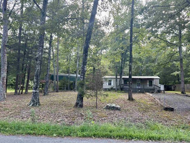 Property Photo:  1003 Cove Creek  AR 72131 