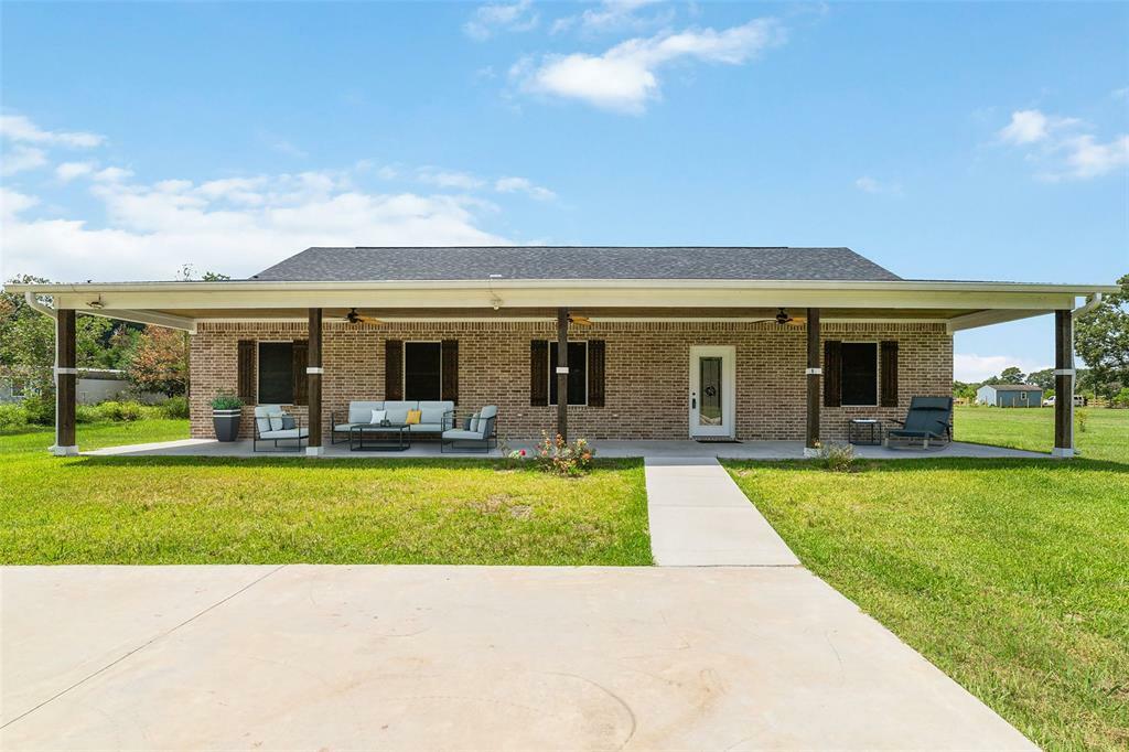 Property Photo:  64 County Road 2293  TX 77327 