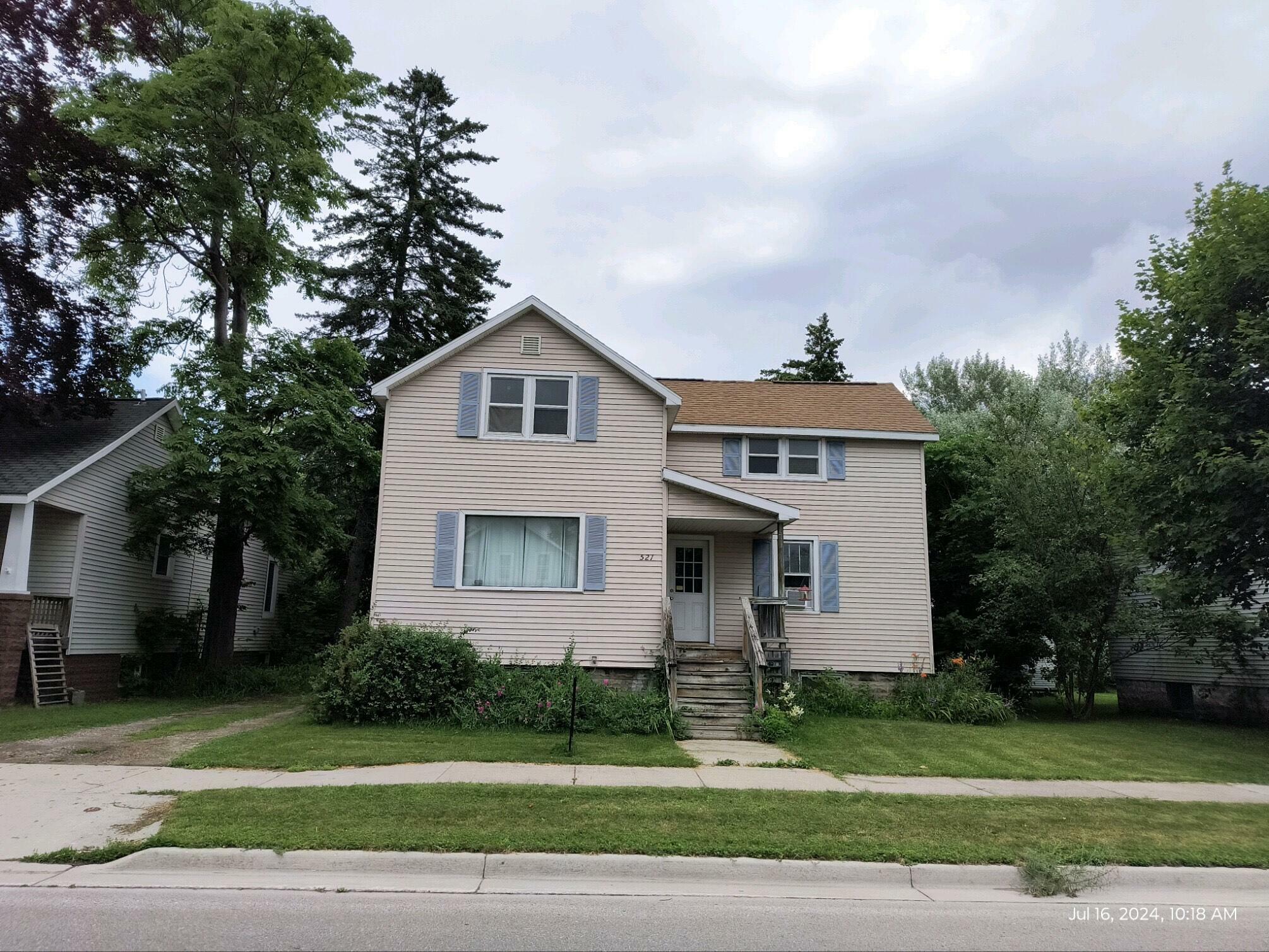 Property Photo:  521 W Miller Street  MI 49707 