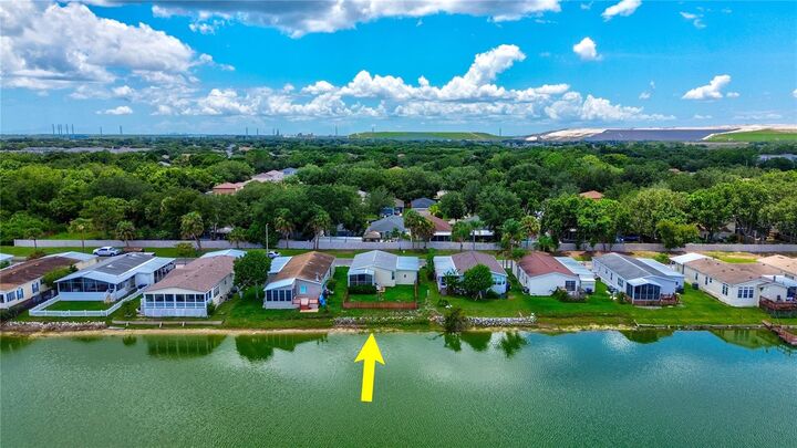 Property Photo: 8636 Fantasia Park Way FL 33578