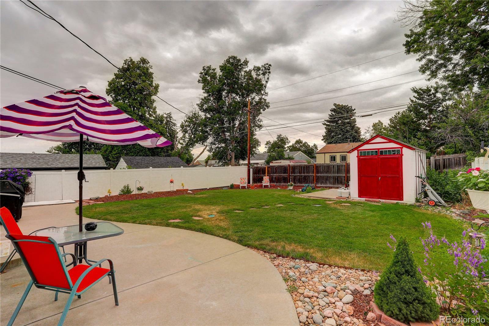 Property Photo:  1856 S Stuart Street  CO 80219 