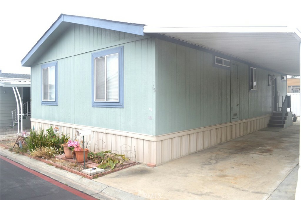 Property Photo:  7850 Slater Avenue Space #66  CA 92647 