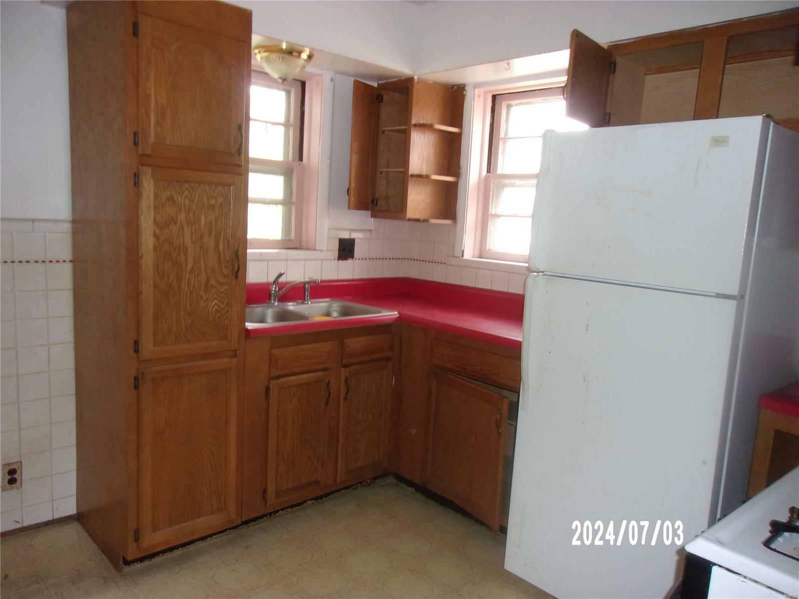 Property Photo:  1633 Veronica Avenue  MO 63147 