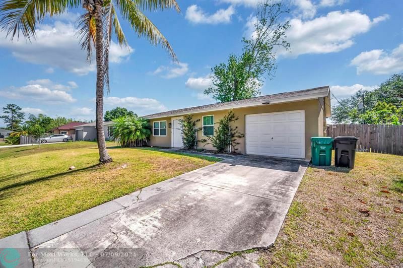 Property Photo:  1721 SW Angelo St  FL 34953 