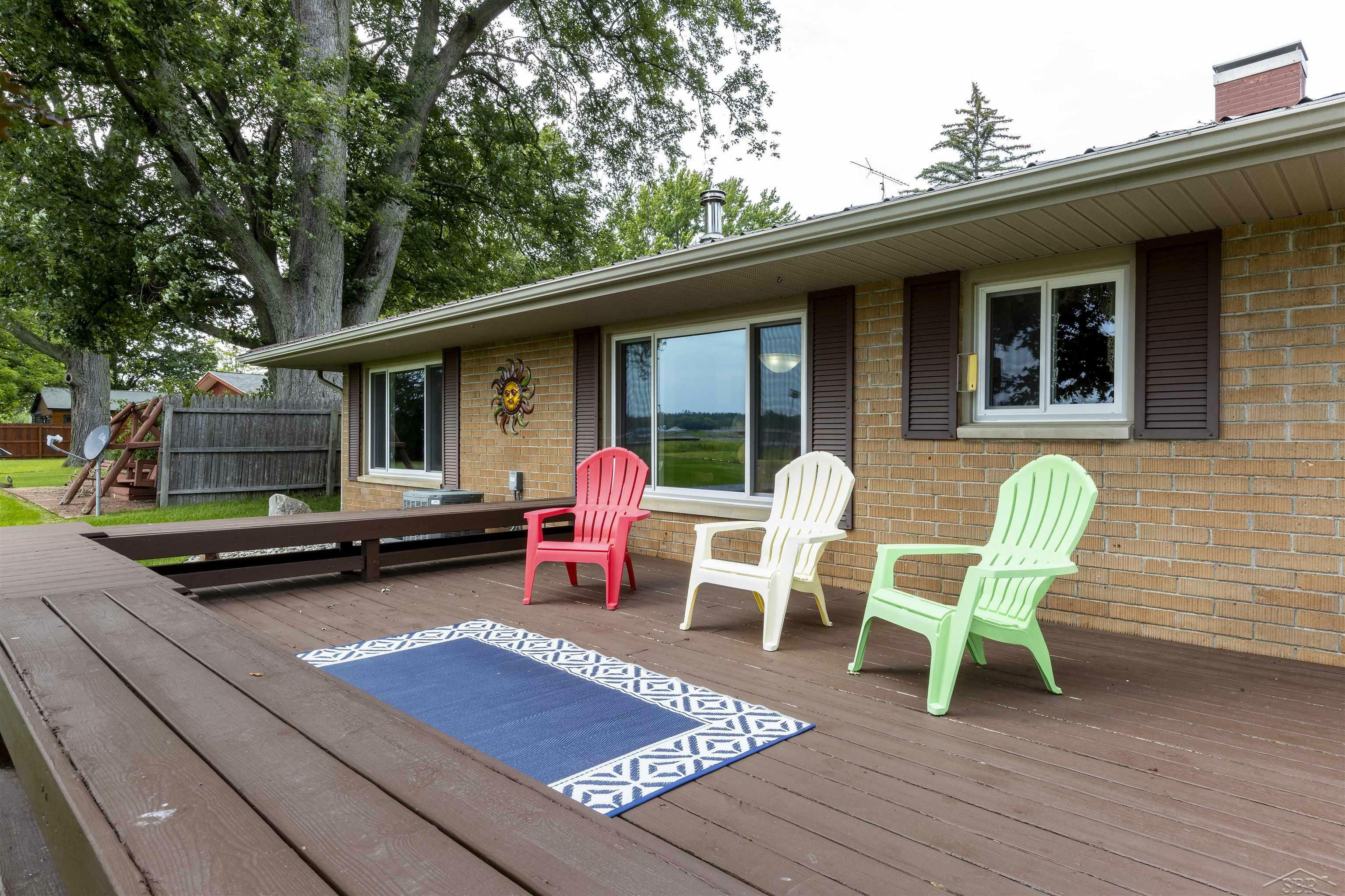 Property Photo:  415 Twin Lake  MI 48612 