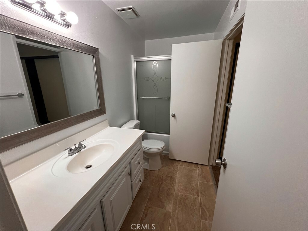 Property Photo:  10580 Lakeside Dr N Unit # J N J  CA 92840 