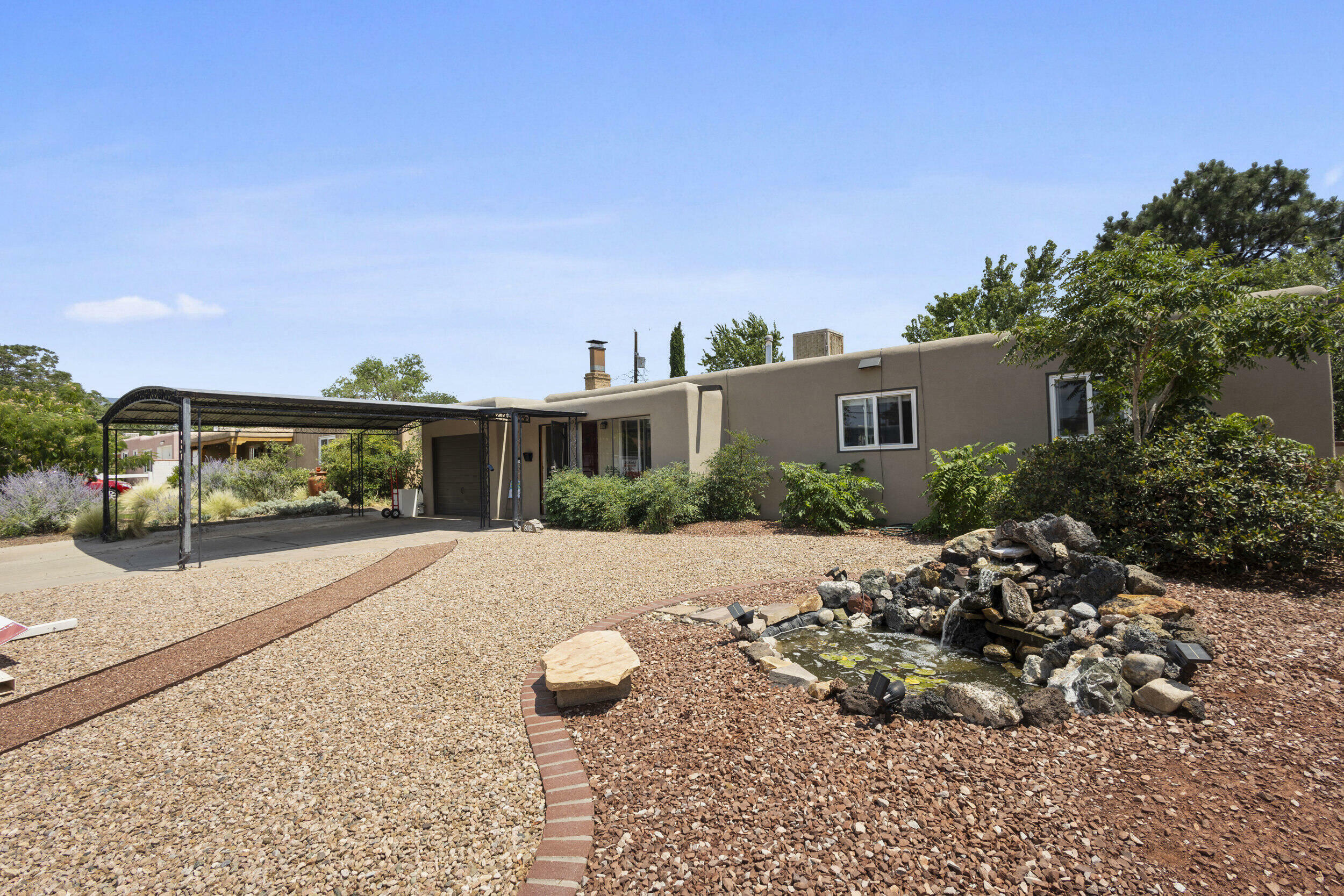 Property Photo:  8012 Hannett Avenue NE  NM 87110 