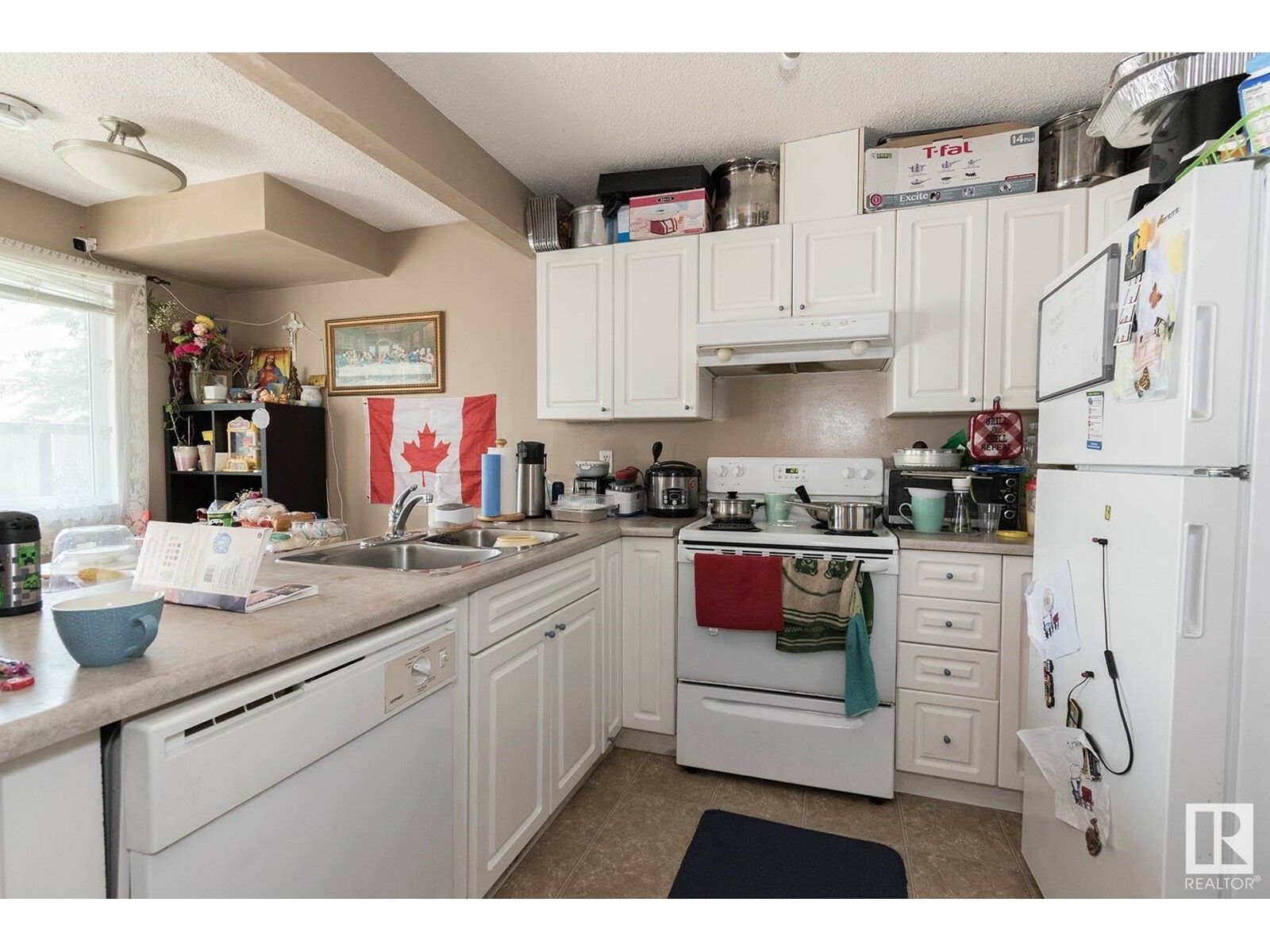 Property Photo:  #135 166 Bridgeport Bv  AB T9K 8K3 