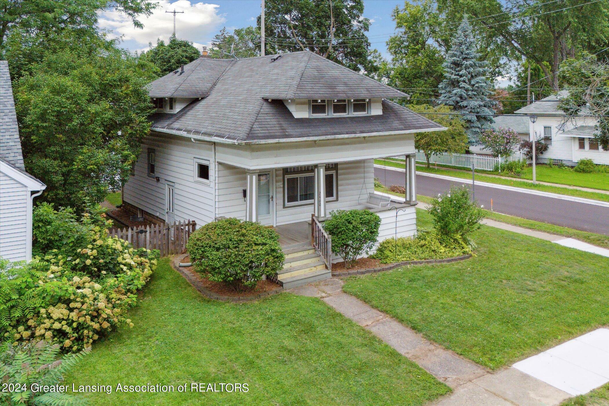 Property Photo:  2400 Strathmore Road  MI 48910 