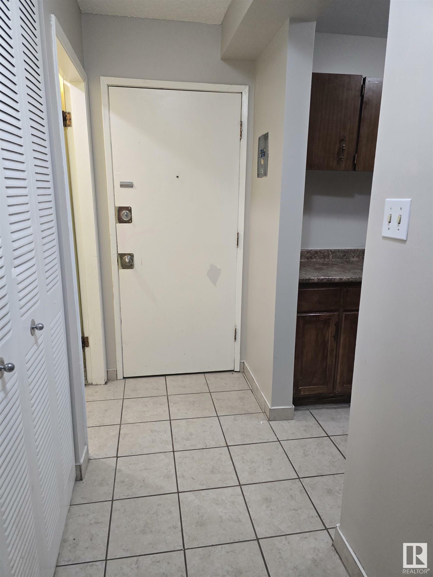 Property Photo:  5715 133 Avenue NW 14C  AB T5A 0K3 