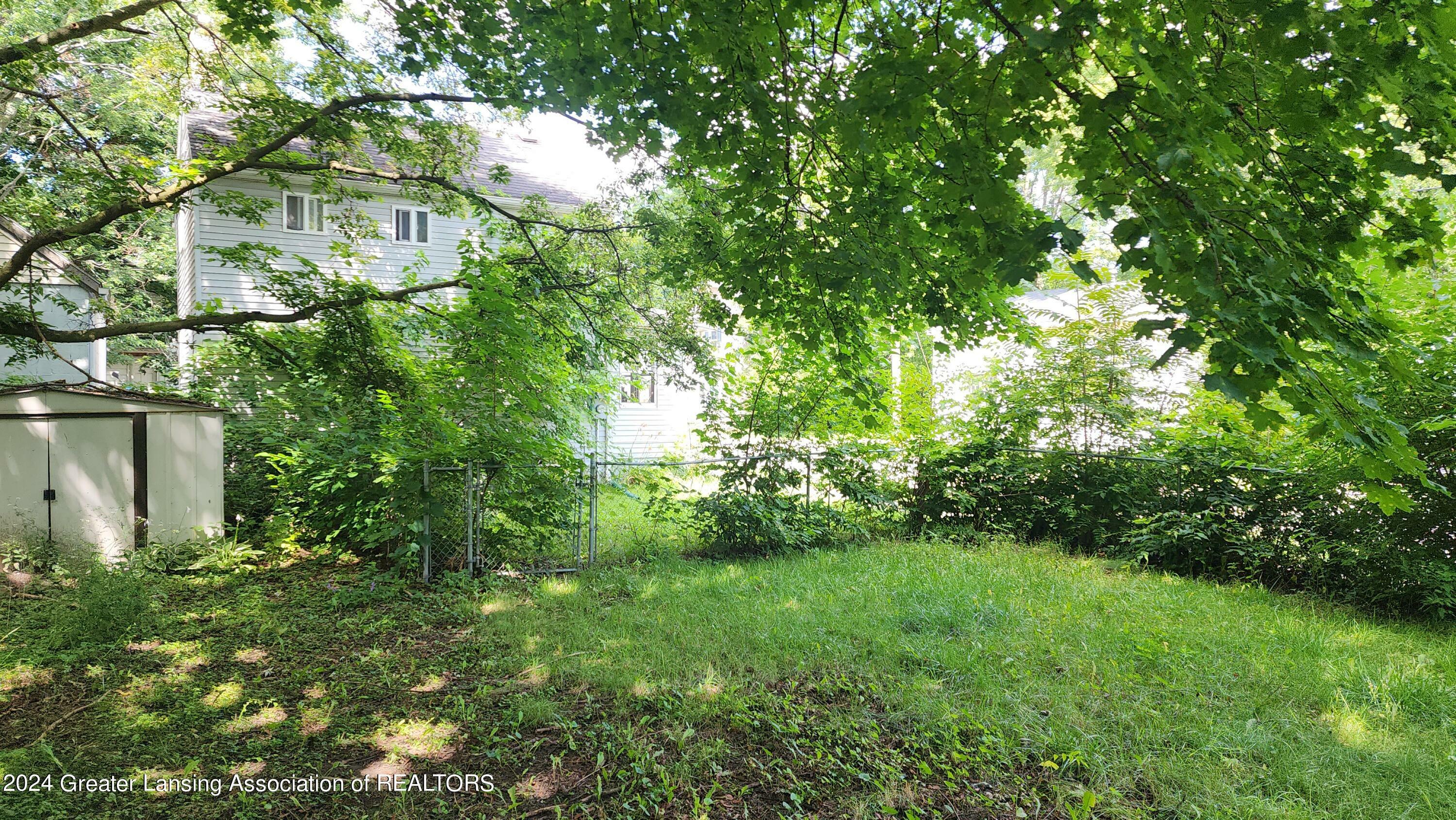 Property Photo:  1700 Lyons Avenue  MI 48910 