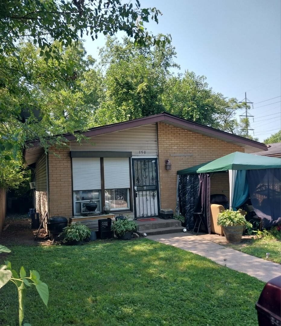 Property Photo:  150 W 156th Street  IL 60426 