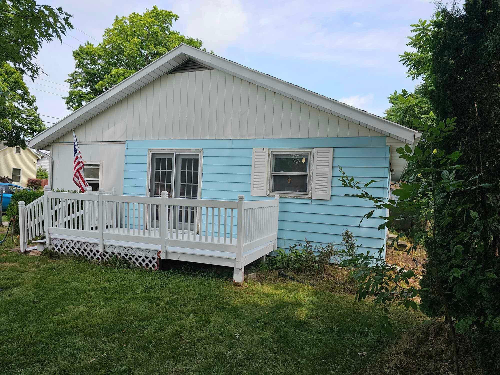 Property Photo:  144 Probasco Street  MI 49318 