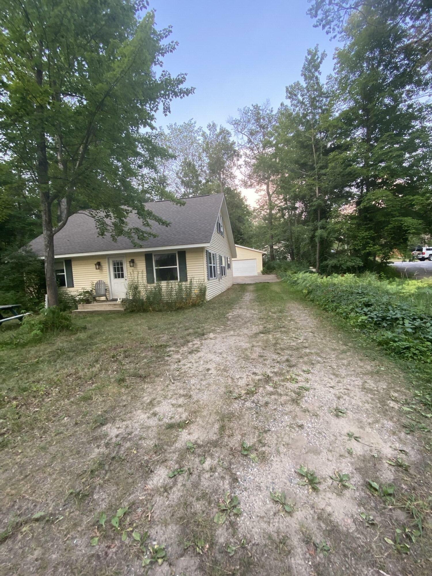 Property Photo:  1323 McIntyres Landing Road  MI 49738 