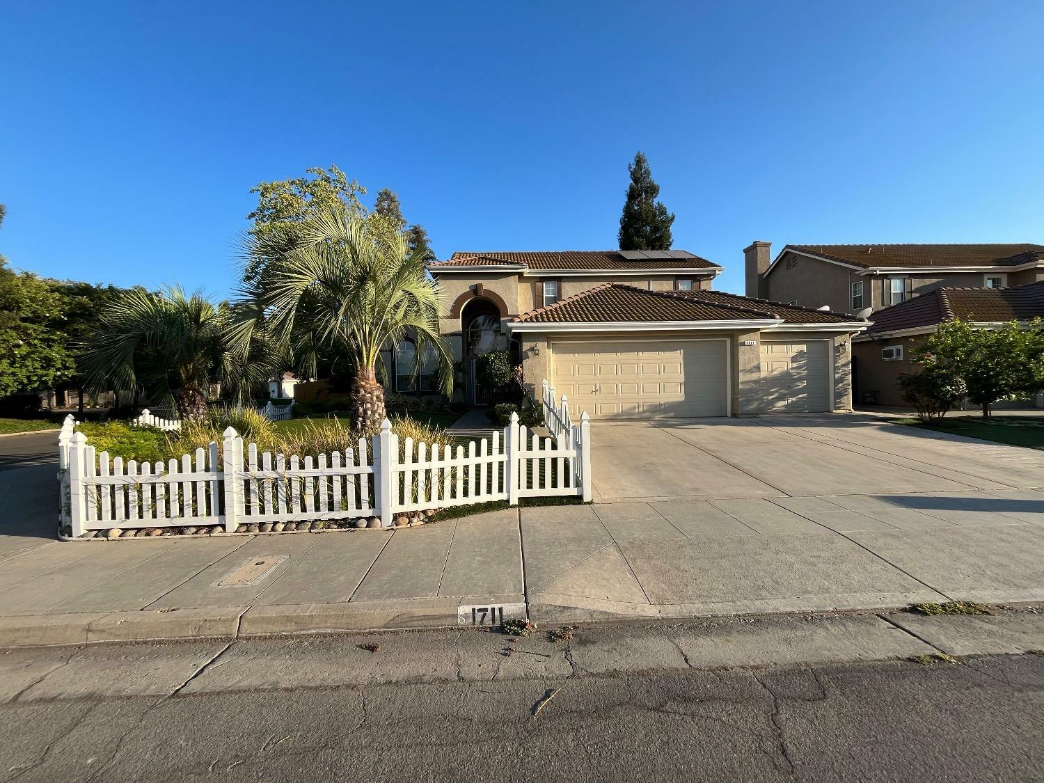 Property Photo:  1711 E Desert Island Drive  CA 93730 