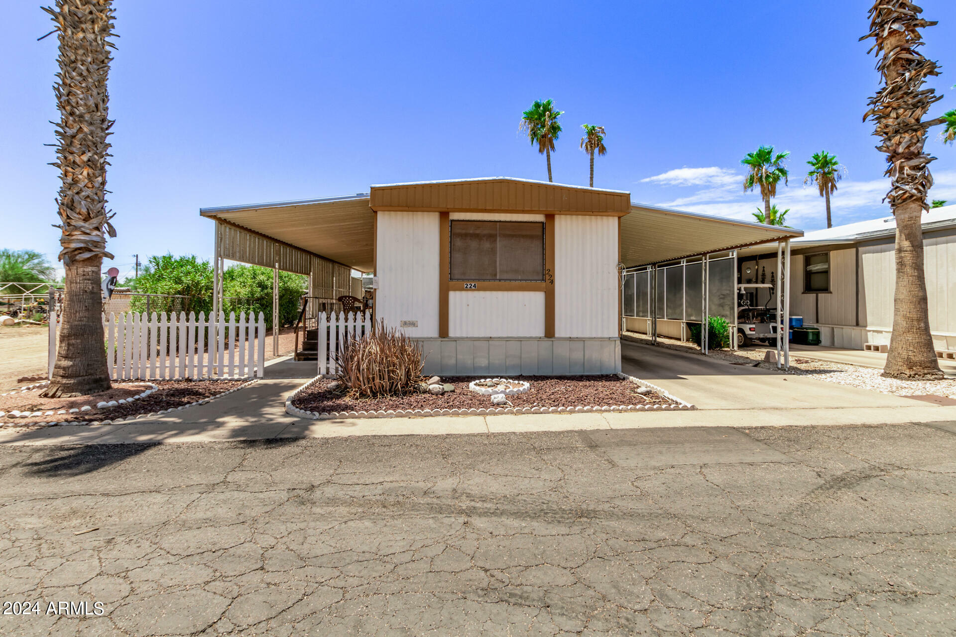 Property Photo:  10220 E Apache Trail -- 224  AZ 85120 