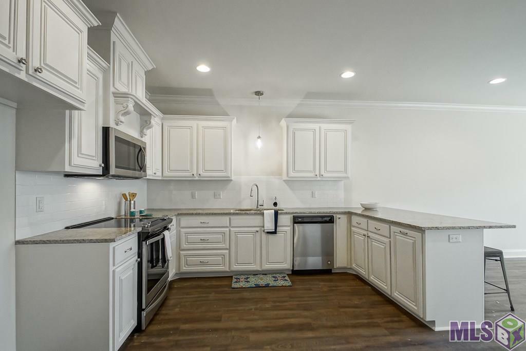 Property Photo:  9017 Lockhart Rd 4D  LA 70726 