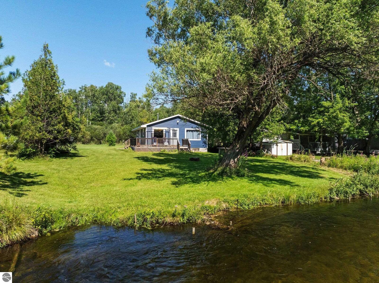 Property Photo:  10791 Riverside Drive  MI 49640 