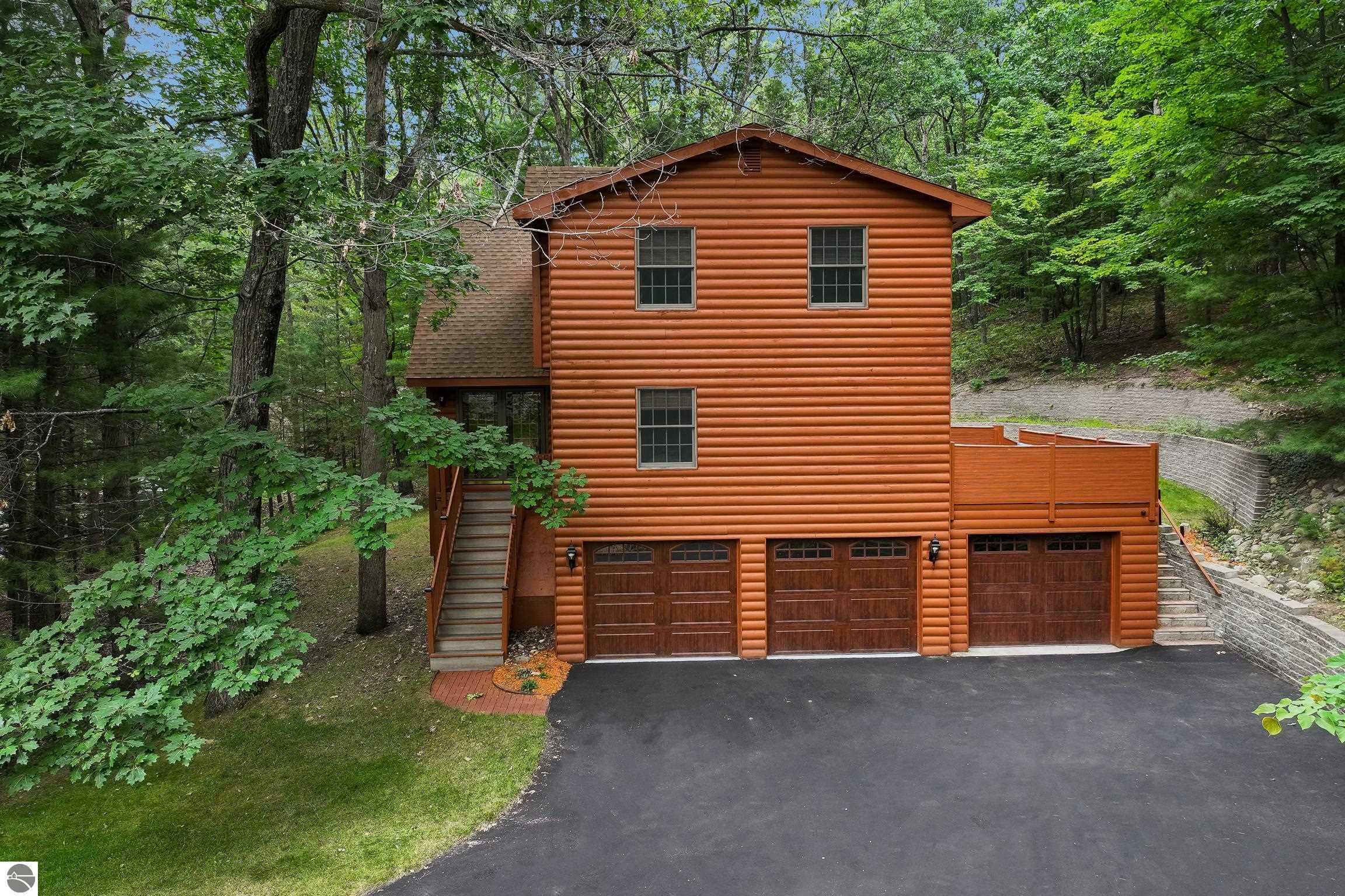 Property Photo:  3670 Holiday Village Road  MI 49686 