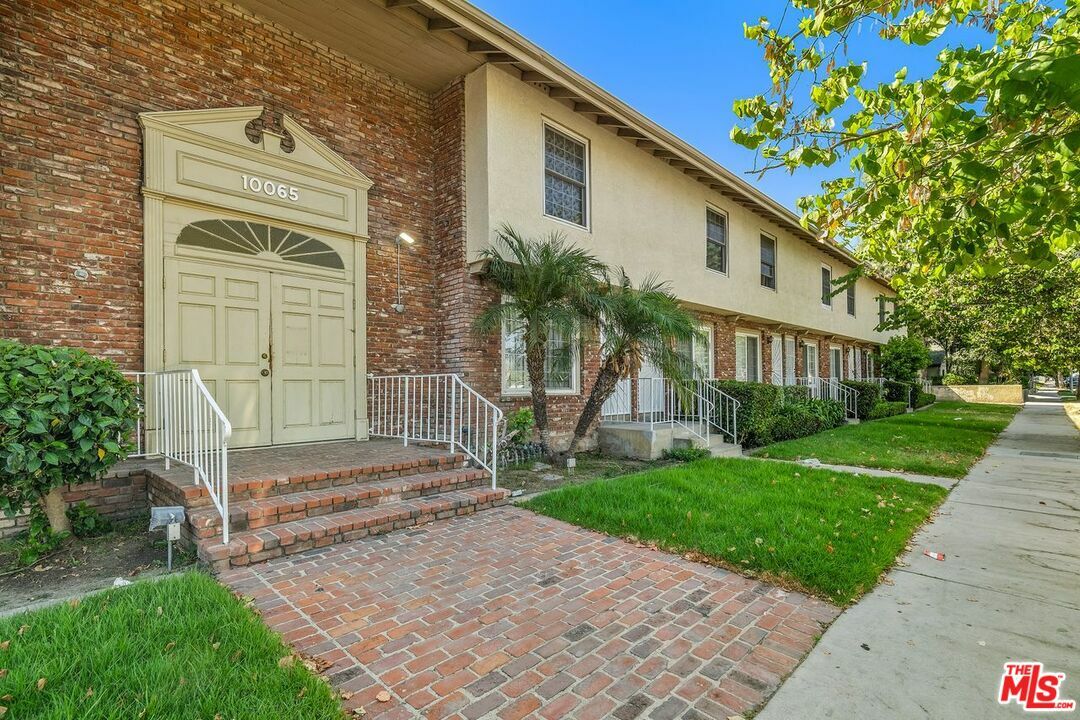 Property Photo:  10065   De Soto Ave 205  CA 91311 