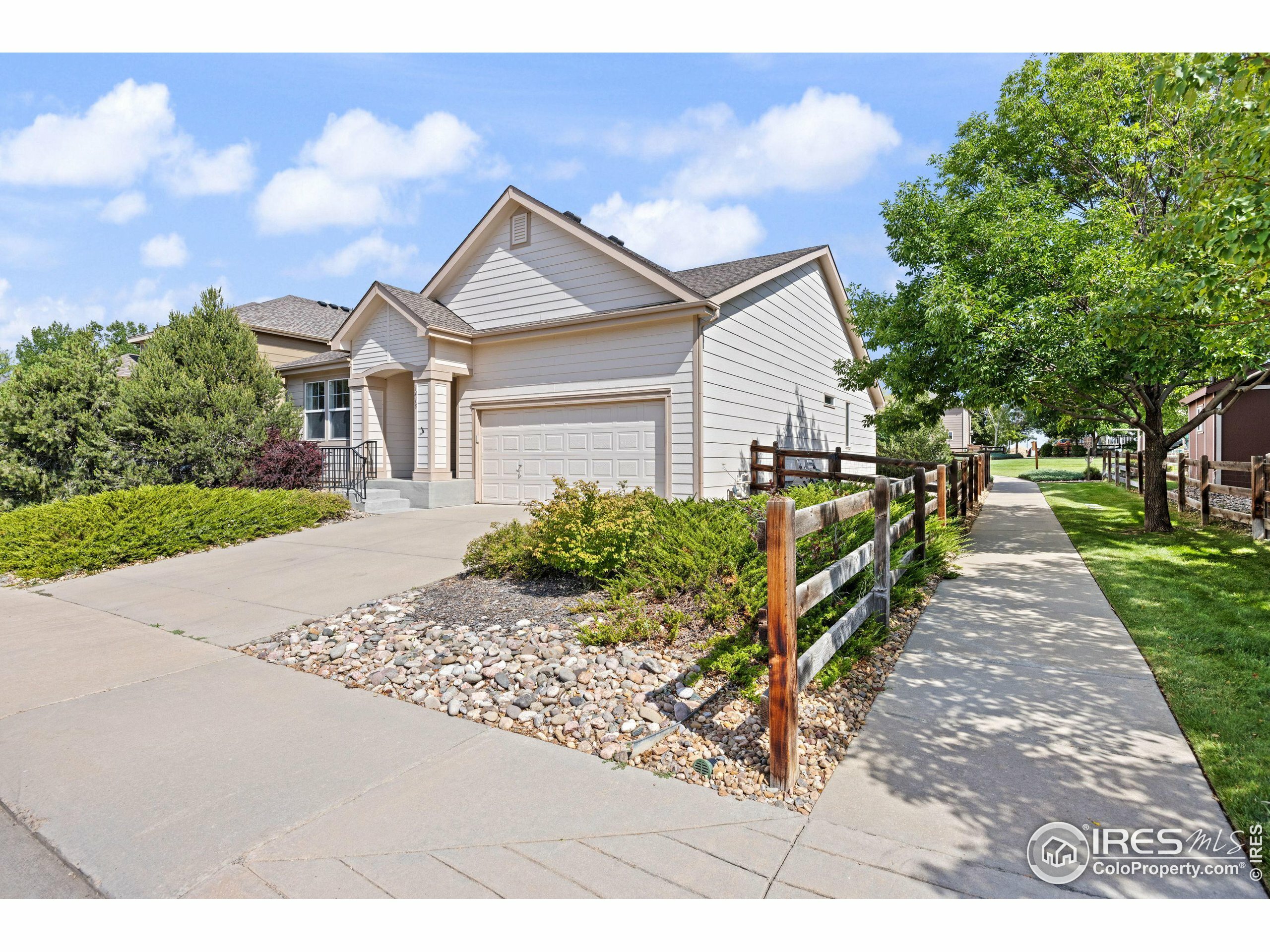 Property Photo:  1418 Tonkin Pl  CO 80504 