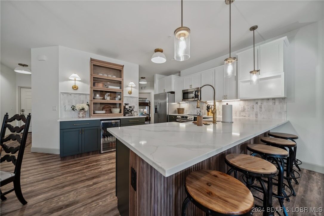 Property Photo:  186 Sunset Palms Drive 2-O  MO 65020 