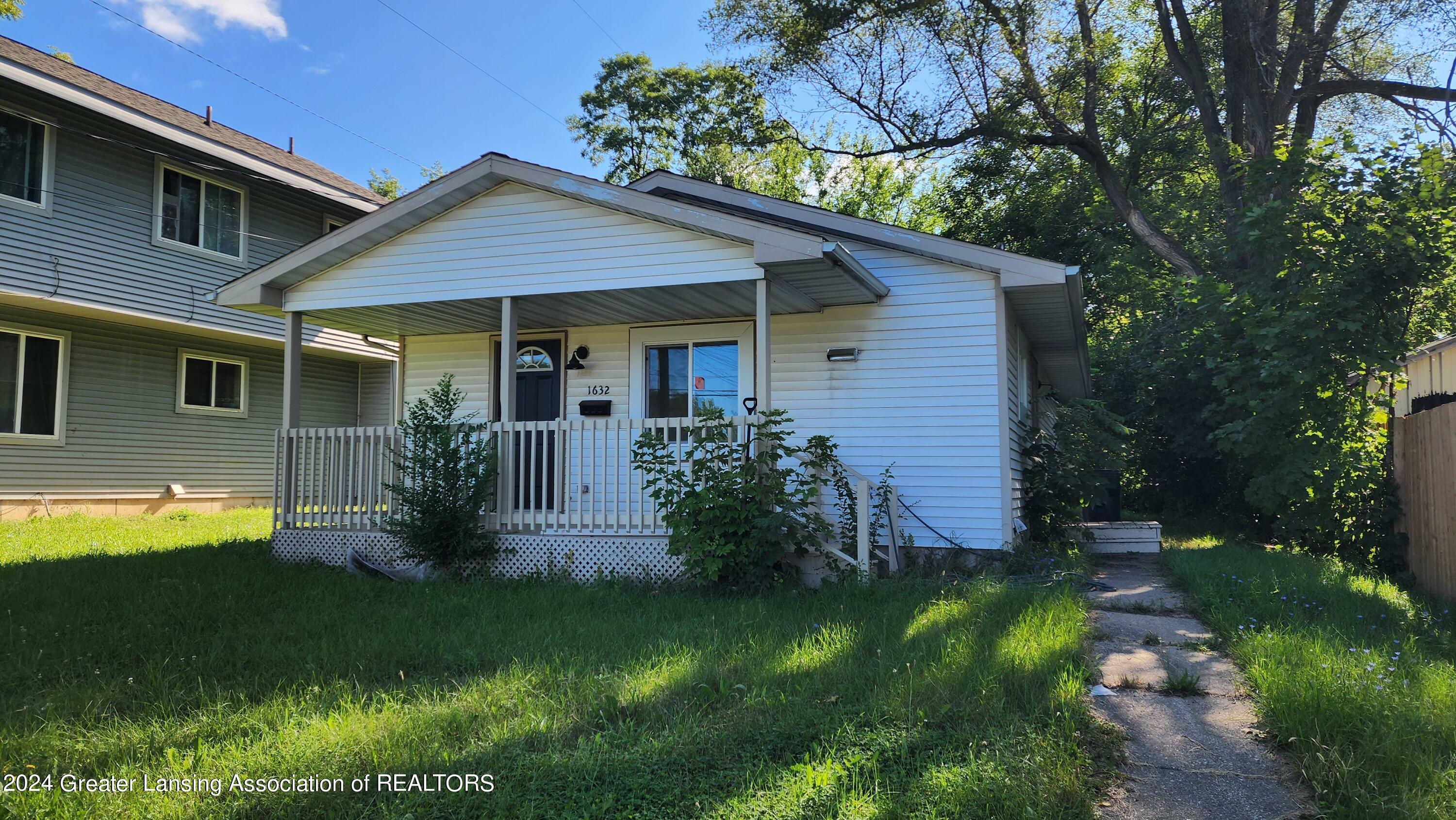 Property Photo:  1632 N High Street  MI 48906 