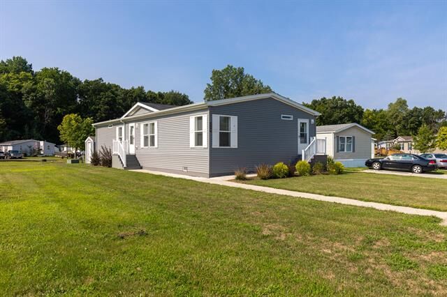 Property Photo:  539 Harwood Court 134  MI 48827 