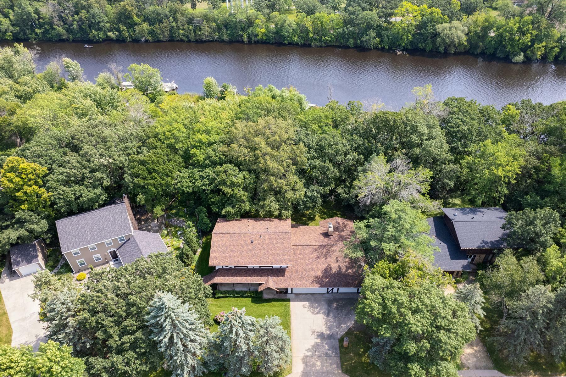 Property Photo:  3418 Rum River Drive  MN 55303 